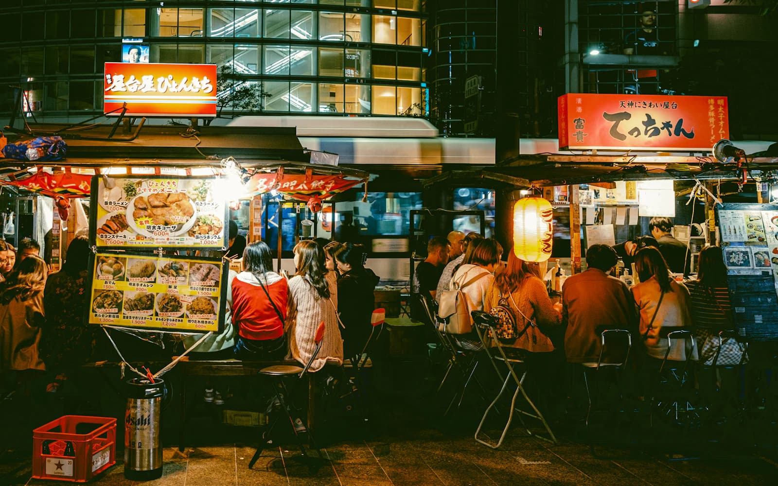 Yatai food stalls, a Fukuoka specialty. They line the Nakasu riverbank every night.